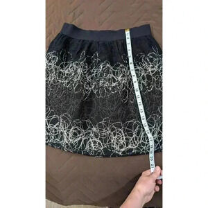 Women's cupcake style mini skirt with wool thread detailing by Miami in size L